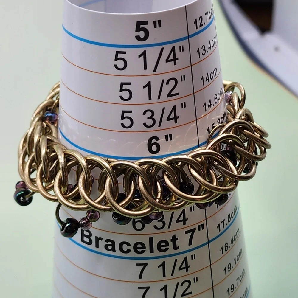 Kenneth Cole Gold Tone Woven Ring Bracelet Purple Bead Chunky Toggle Statement